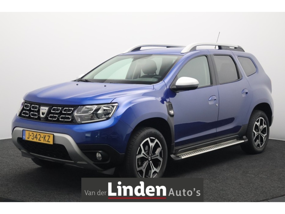 Hoofdafbeelding Dacia Duster - 1.0 TCe Bi-Fuel LPG Prestige | Camera | Navigatie | Trekhaak | Cruise Control | Sides